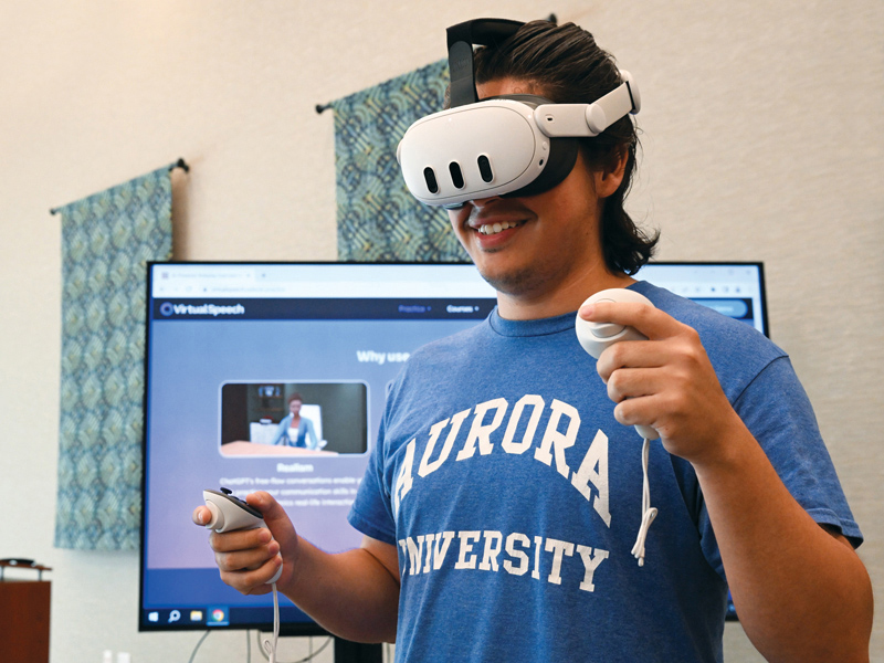 Male student with VR headset.